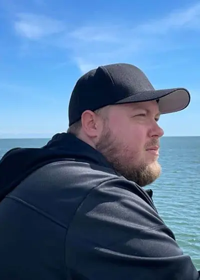 About 1 Lee looking out at the water